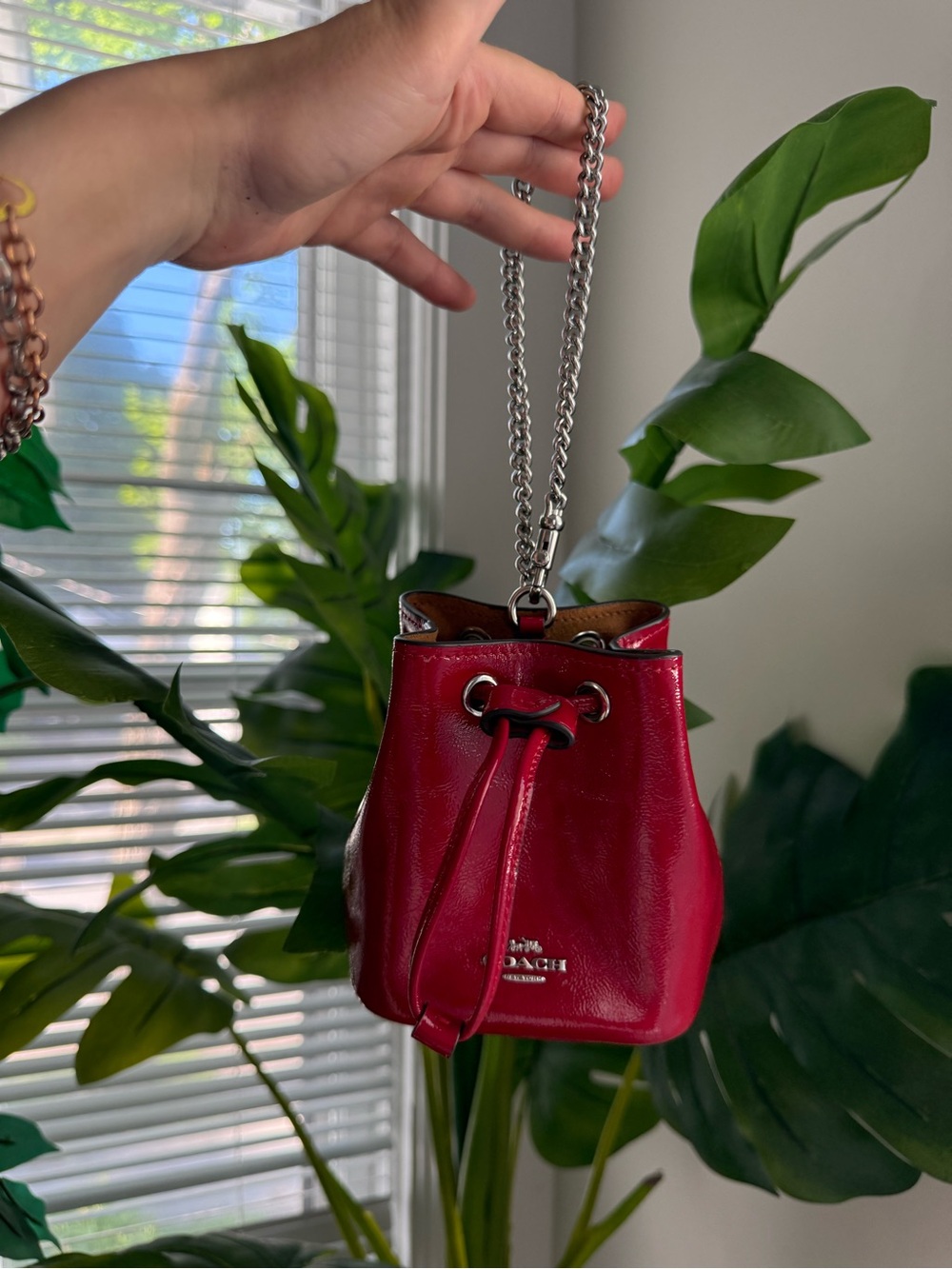 Coach Red Patent Leather Mini Drawstring Bag with Silver Chain